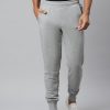 Men Puma Track Pants & Shorts | Buy Puma Men Grey Slim Fit Solid Ess+ 2 Col Logo Tr Cl Sustainable Joggers - Apparel For Men