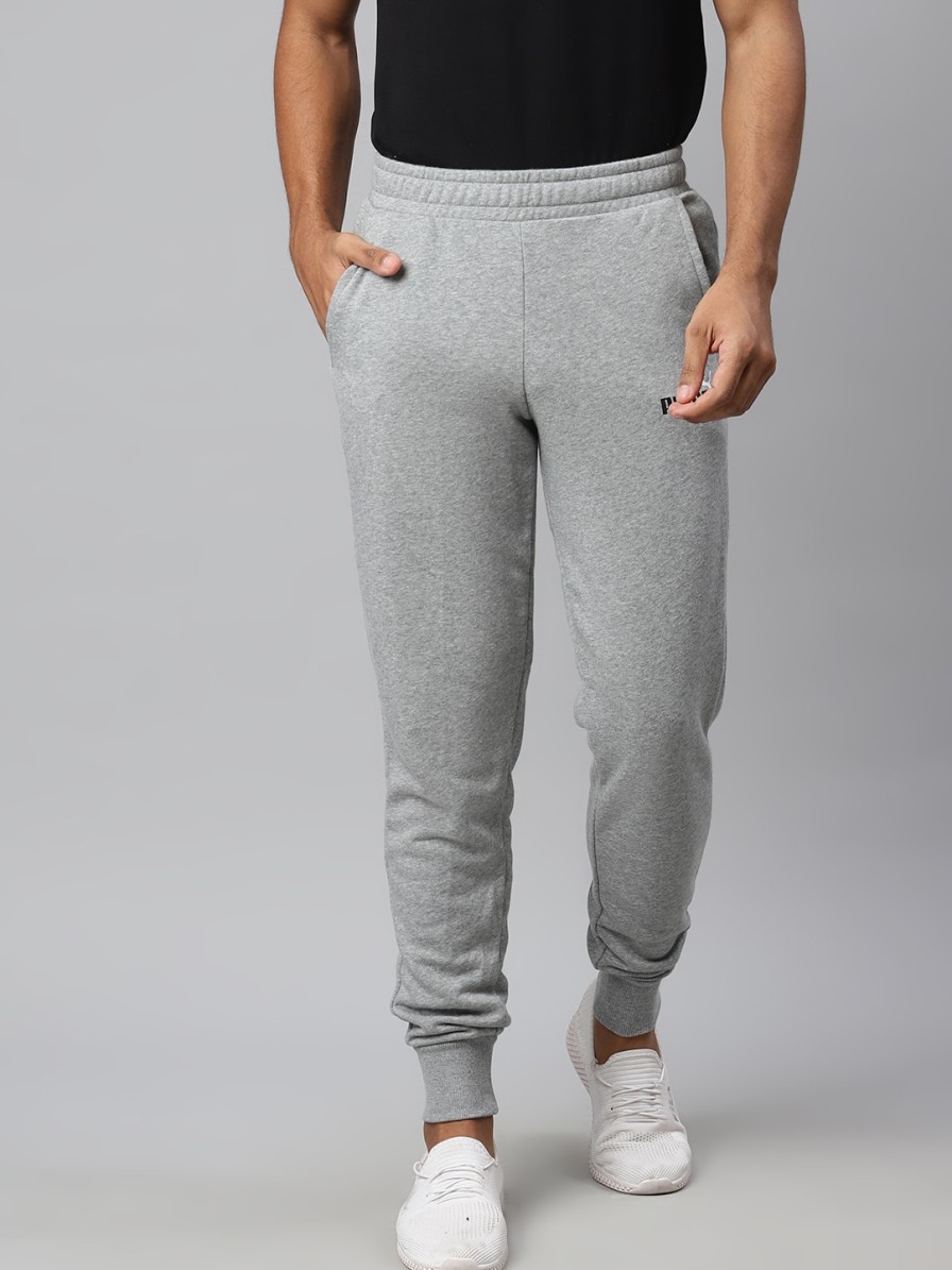 Men Puma Track Pants & Shorts | Buy Puma Men Grey Slim Fit Solid Ess+ 2 Col Logo Tr Cl Sustainable Joggers - Apparel For Men