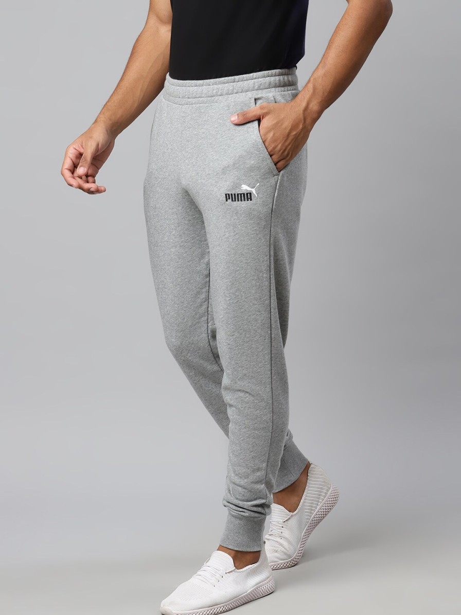 Men Puma Track Pants & Shorts | Buy Puma Men Grey Slim Fit Solid Ess+ 2 Col Logo Tr Cl Sustainable Joggers - Apparel For Men