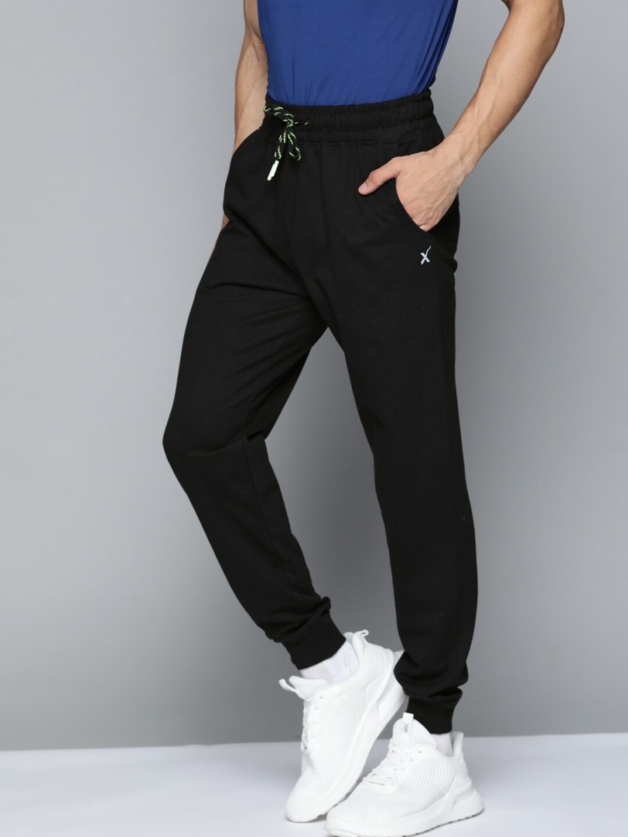 Men HRX by Hrithik Roshan Track Pants & Shorts | Buy Hrx By Hrithik Roshan Lifestyle Men Jet Black Bio Wash Track Pants - Apparel For Men