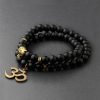 Men Yellow Chimes Rings & Wristwear | Buy Yellow Chimes Unisex Black & Gold Toned Devine Buddha Beads Charm Bracelet - Accessories For Unisex